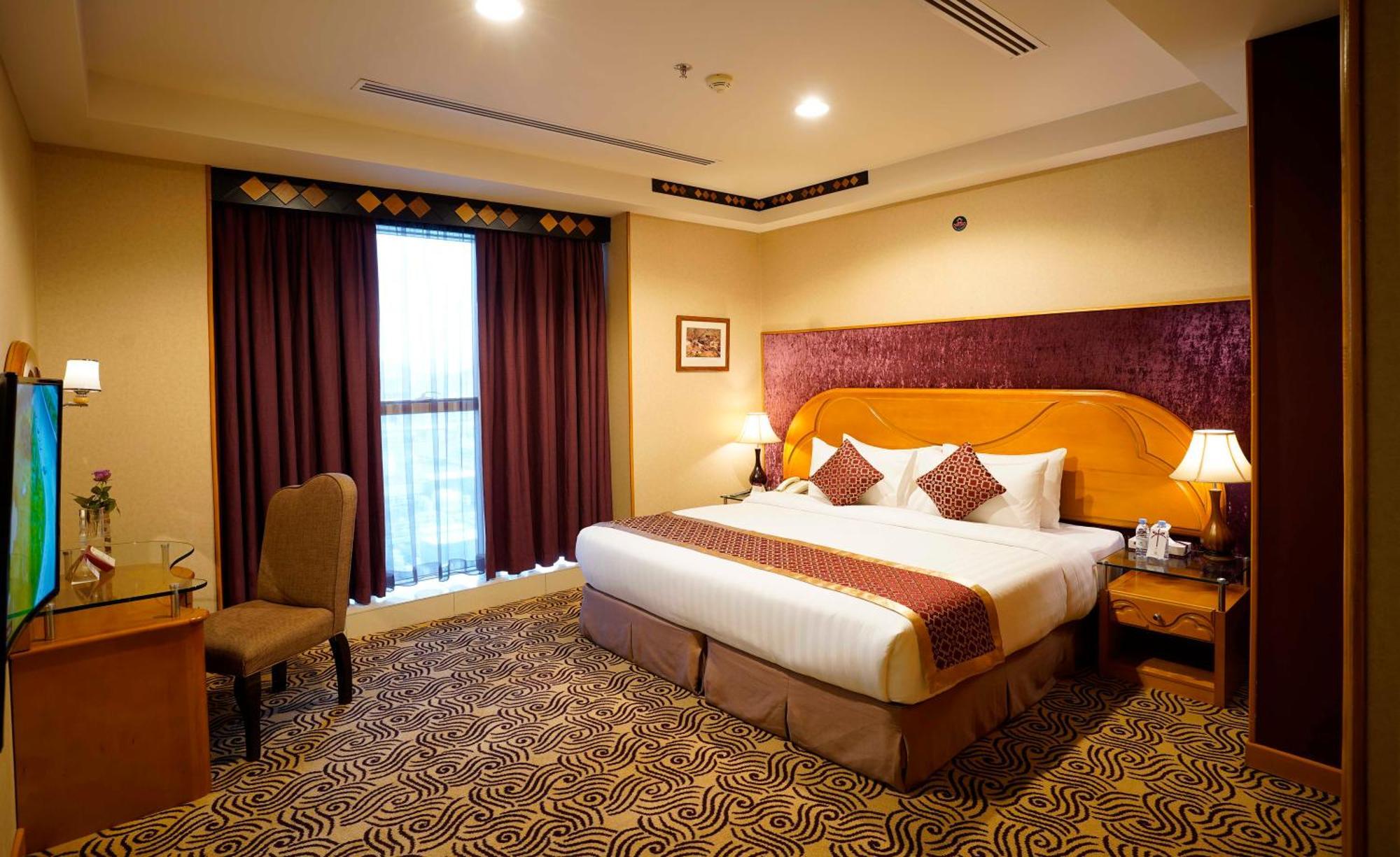 Awaliv International Hotel Ta'if Camera foto A bedroom at the hotel