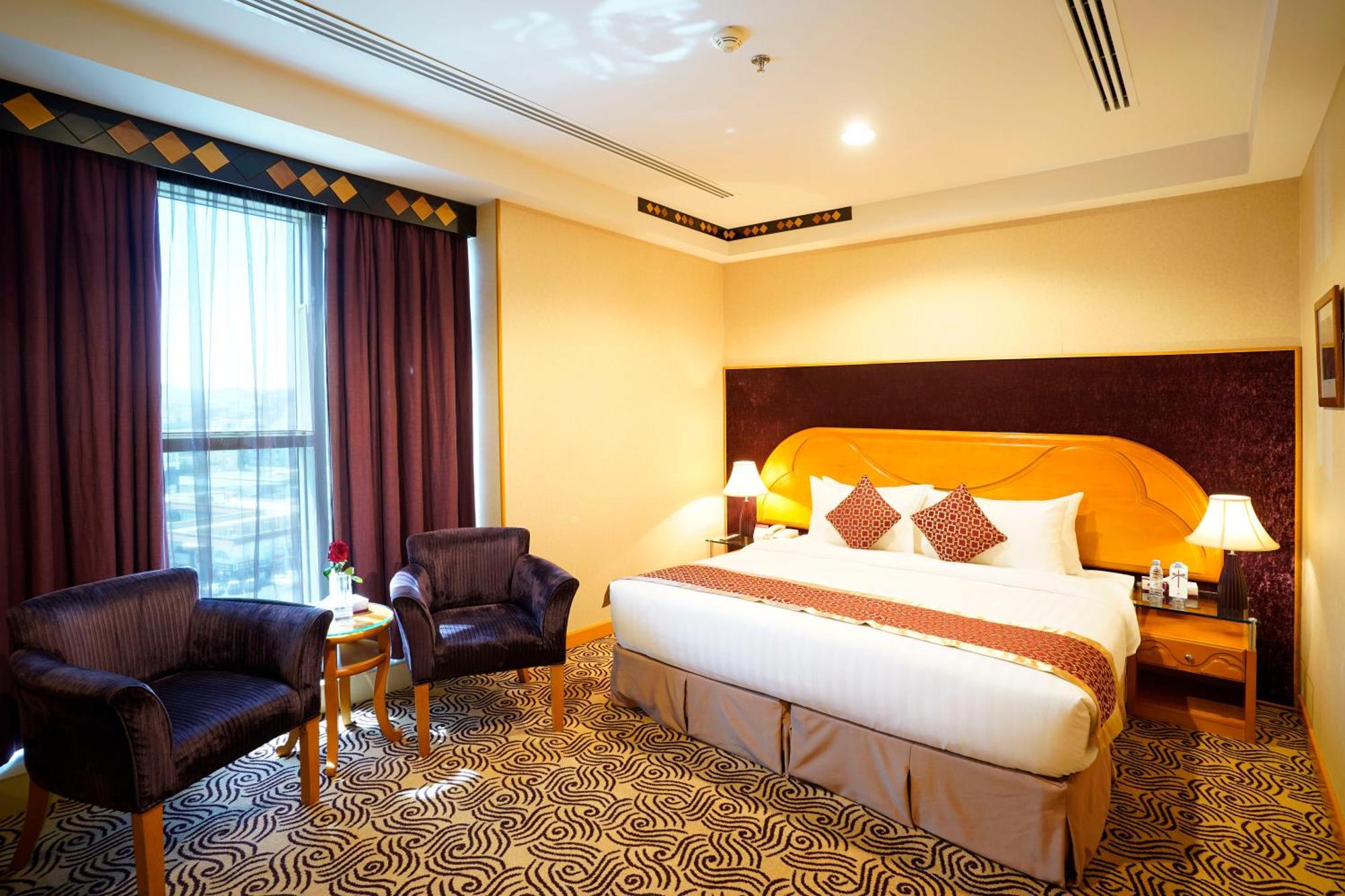 Awaliv International Hotel Ta'if Camera foto A room at the hotel